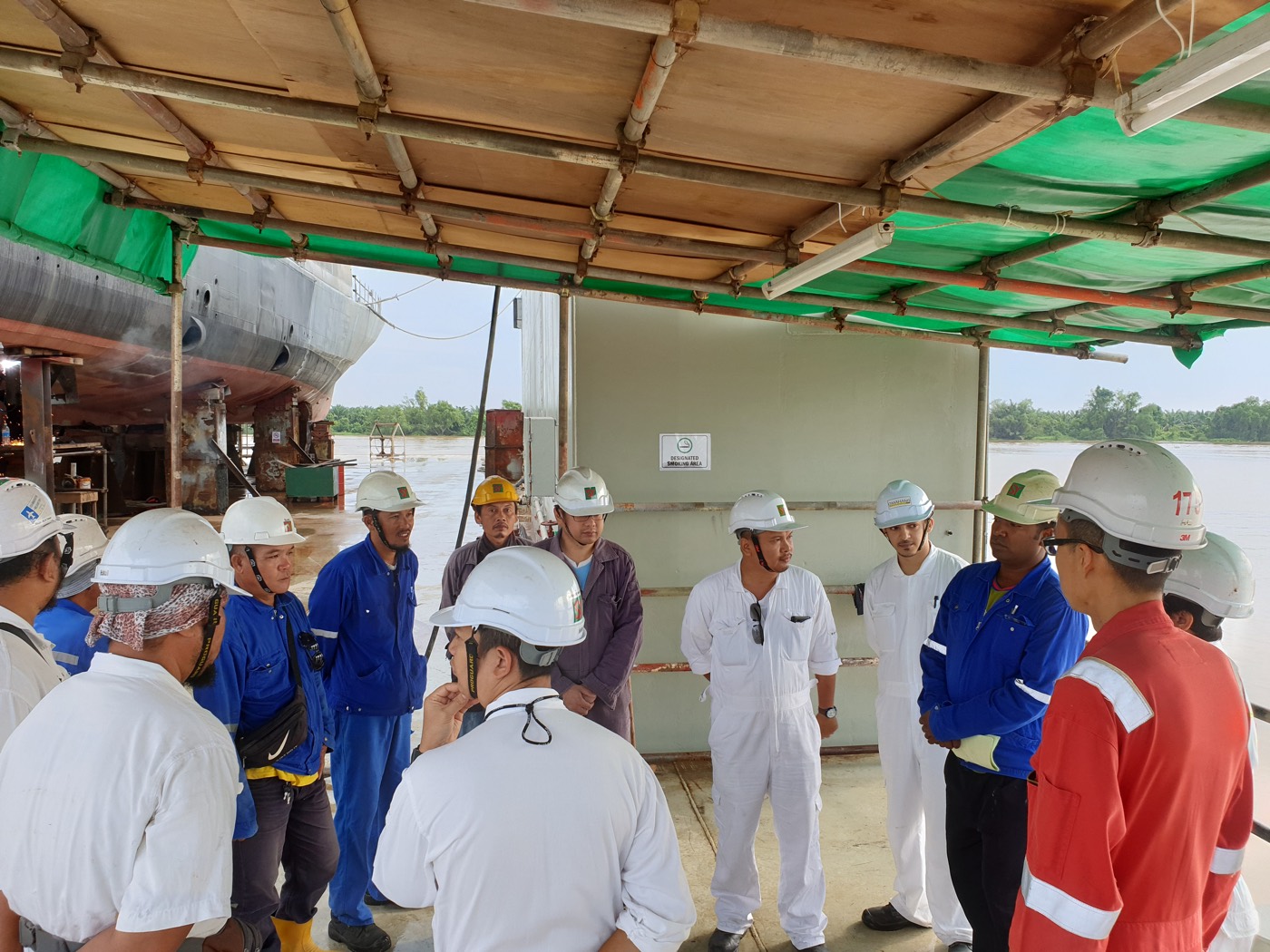 Morning briefing on the quayside at Shin Yang Shipyard, Miri, 2019